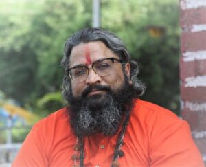 Spiritual guide in saffron robes, Agnitra Foundation